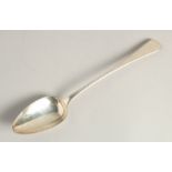 A GEORGE III SILVER LONG HANDLED GRAVY SPOON. 12ins long. London1808. Maker S. H.