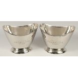 A PAIR OF "CUVEE DE PRESTIGE" OVAL CHAMPAGNE COOLERS. 1ft 2ins wide.