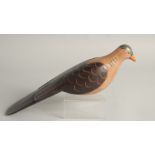 A GOOD PAINTED WOODEN DECOY DUCK. 9ins long.