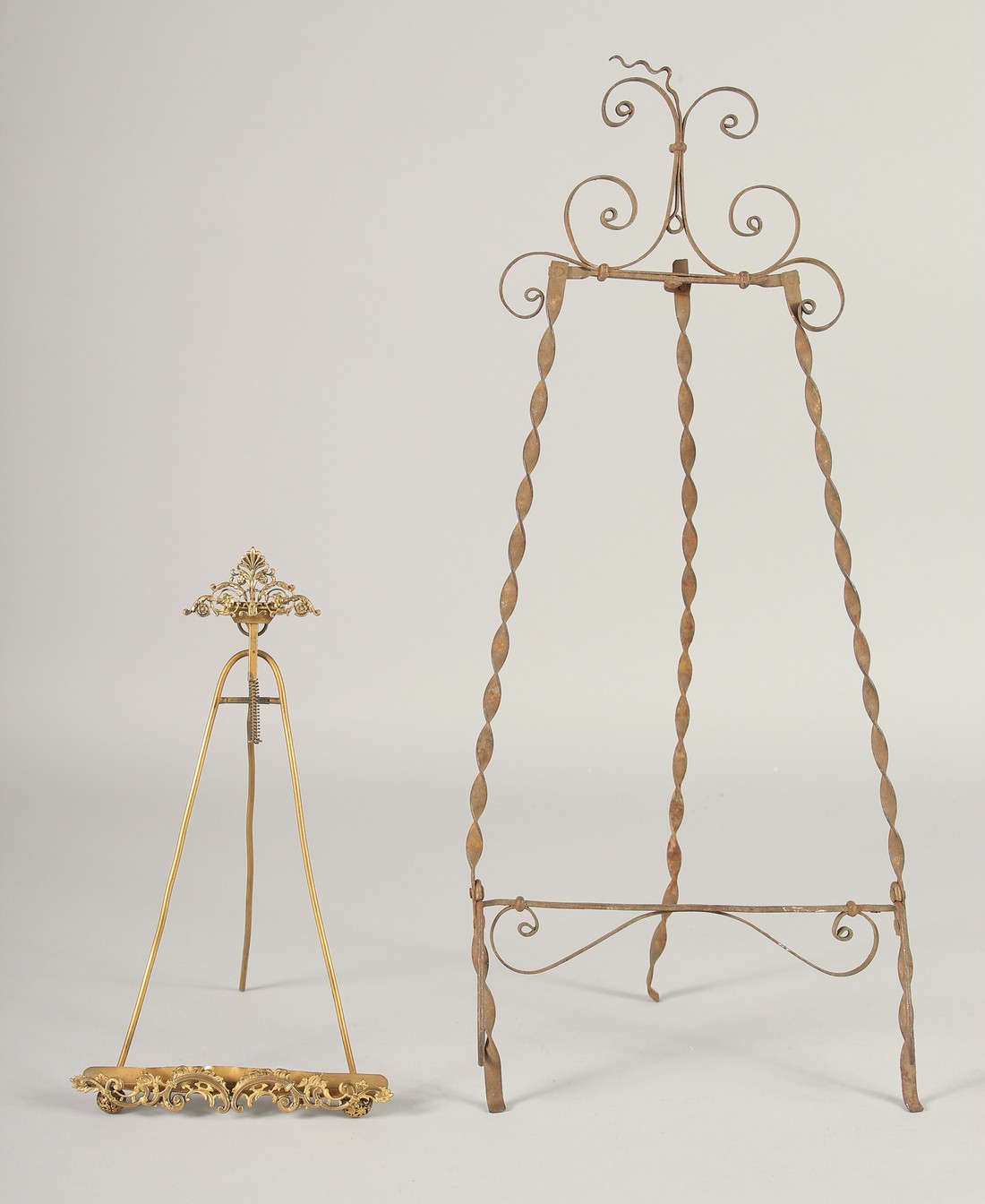 TWO GILT PICTURE EASELS.