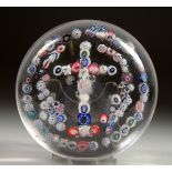 A MILLEFIORI CRUCIFIX PAPERWEIGHT. Possibly CLICHY. 3.5ins diameter.