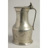 A LARGE 18TH CENTURY PEWTER JUG AND COVER. 10ins high.