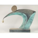 MANNER OF HENRY MOORE. AN ABSTRACT BRONZE SCULPTURE. 2ft 2ins high, 2ft 10ins long.