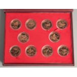 A COLLECTION OF TEN CHINESE COINS in presentation box.