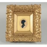 A GOOD VICTORIAN GILT FRAMED SILHOUETTE of a lady, head and shoulders. 2.75ins x 2ins.