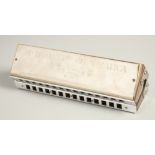 M. HOHNER. CHROMATIC BOSS HARMONICA. No. 265. 8.5ins long, in a case.