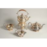 A GOOD GEORGIAN SILVER PLATE THREE PIECE TEA SET AND SIMILAR KETTLE ON STAND (4).