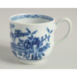 AN 18TH CENTURY WORCESTER EARLY PRINTED COFFEE CUP in under glaze blue, with the Plantation