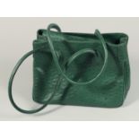 A FRANCHETTI BOND OSTRICH SKIN BAG 11ins x 8 ins with two leather handles.