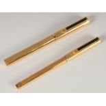 TWO DUNHILL GILT PENS, a ballpoint and fountain pen.