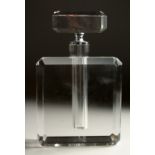 A LARGE CHANEL STYLE PLAIN GLASS SCENT BOTTLE AND STOPPER. 10.5ins high.