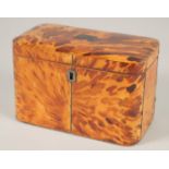A REGENCY TORTOISESHELL TWO DIVISION TEA CADDY. 6.75ins