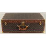 A LARGE LOUIS VUITTON SUITCASE. No. 1023430. With Louis Vuitton label. Lock no. 1252082. 31.5ins