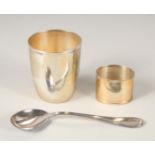 ARGENTO. A THREE-PIECE SILVER CHRISTENING SET. Tumbler, serviette ring, and spoon. Cased.