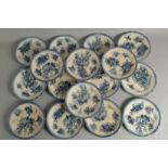 A SET OF SIXTEEN FLOW BLUE DINNER PLATES. 9ins diameter.