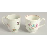 TWO 18TH CENTURY WORCESTER COFFEE CUPS, one painted with a large bouquet of flowers. scattered