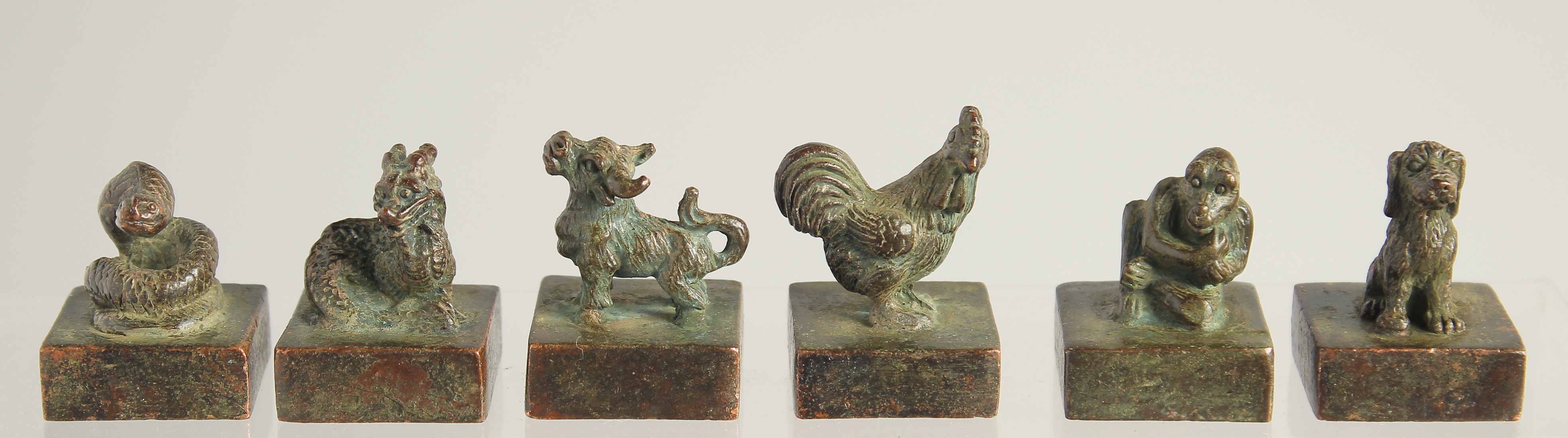 SIX SMALL CHINESE BRONZE SEALS.