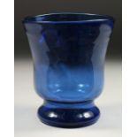 AN OLD BLUE GLASS VASE. 5.5ins high.
