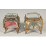 TWO GOOD SQUARE GLASS AND GILT JEWELLERY BOXES, one Torino, 1911. 2.5ins square.