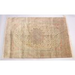A GOOD SHIRVAN SILK RUG, pink ground with all over floral decoration. 6ft 5ins x 4ft 3ins.