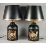 A PAIR OF BLACK TOLEWARE CANNISTER LAMPS AND SHADES 1ft 7ins high.