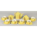 AN ART DECO YELLOW TEA SET, comprising large tea pot, small tea pot, sugar bowl, six cups and