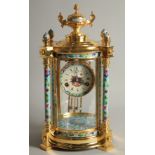 A GOOD GILT METAL AND CLOISONNE ENAMEL CIRCULAR COLUMN CLOCK with urn finial. 1ft 6ins high.