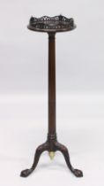 A GOOD GEORGIAN STYLE MAHOGANY TRIPOD STAND the top with pierced fret carving, on tripod support,