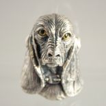 A SILVER DOG BROOCH.