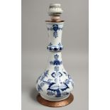 A 19TH CENTURY MEISSEN BLUE AND WHITE ONION PATTERN LAMP. 12ins high.