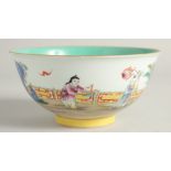 A CHINESE FAMILLE ROSE PORCELAIN BOWL the interior with turquoise glaze. 17cm diameter.