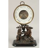 A GOOD HOLOSTERIC CIRCULAR BAROMETER by Fred J. COX, 26 Ludgate Hill, London, on a superb bronze