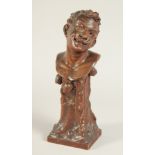 SCHACH AN ART DECO CARVED WOOD BUST OF A MAN ON A PLINTH. W. GOGGS sc. 1914 PAETZ. 14.5ins high.