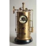 A GOOD INDUSTRIAL PISTON DRUM CLOCK as a boiler. 1ft 11ins high.
