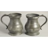 TWO PEWTER QUART TANKARDS 6ins high.