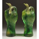 A GOOD PAIR OF TITTOT GREEN GLASS ENTWINED BIRDS. Signed 6.5ins high.