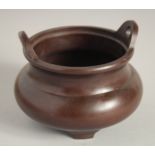 A SMALL CHINESE BRONZE CIRCULAR CENSER. 4ins diameter.