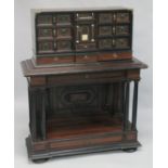 A GOOD 18TH - 19TH CENTURY ROSEWOOD BRASS MOUNTED AND BRASS LINED VARGUENO ON STAND, the top with