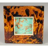 A FAUX TORTOISESHELL SQUARE FRAME. 5ins x 5ins