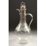 A VERY GOOD VICTORIAN CLARET JUG BY GEORGE FOX with etched glass and engraved and silver mounts,