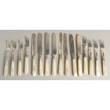 A SET OF SIXTEEN SILVER DESSERT KNIVES AND FORKS with mother-of-pearl handles. Sheffield 1904, in