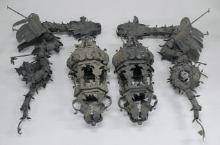A LARGE PAIR OF IRON DRAGON WALL LIGHTS.