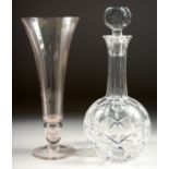 A CUT GLASS PORT DECANTER AND STOPPER and a TULIP GLASS VASE. (2).