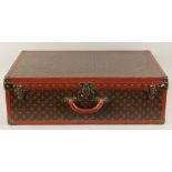 A LARGE LOUIS VUITTON SUITCASE. No. 847181. With Louis Vuitton label. Lock no. 105394. 31.5ins