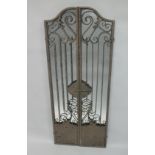 A MIRRORED BACK CAST IRON GATE. 5ft high.