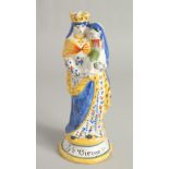 A FIANCE POTTERY FIGURE "THE VIRGIN MARY". 8ins high.