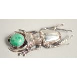 A SILVER SCARAB BROOCH.