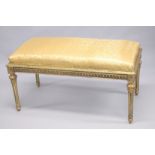 A GILTWOOD RECTANGULAR WINDOW SEAT with padded top. 3ft 7ins long.