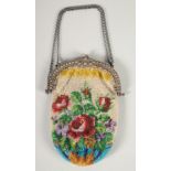 A SILVER AND BEADWORK EVENING PURSE