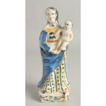 AN 18TH CENTURY FIANCE POTTERY FIGURE, Madonna and child. 12ins high.
